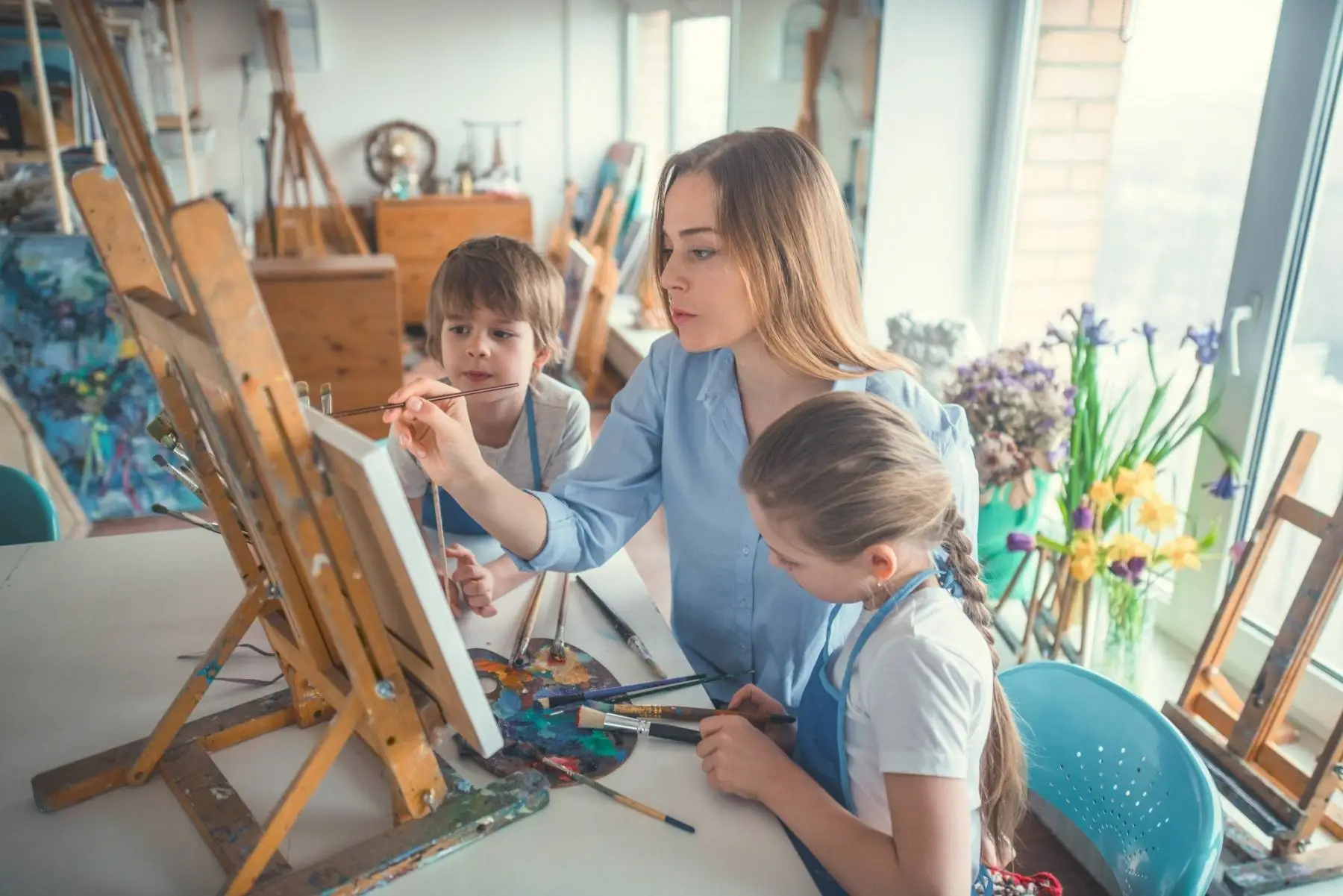 Teacher guiding students during a lesson